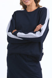 A model wearing the Fundamental Sloane Cotton Fleece Crew in colour Navy (Blue), from the front, cropped image