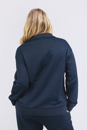A model wearing the Fundamental Tatum Half Zip Cotton Blend Sweat in colour Navy (Blue), from the back