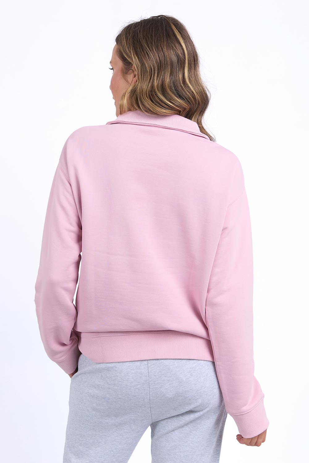 A model wearing the Fundamental Tatum Half Zip Cotton Blend Sweat in colour Softpink (Pink), from the back