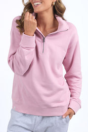 A model wearing the Fundamental Tatum Half Zip Cotton Blend Sweat in colour Softpink (Pink), from the front, cropped image