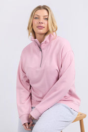 A model wearing the Fundamental Tatum Half Zip Cotton Blend Sweat in colour Softpink (Pink), from the front, cropped image