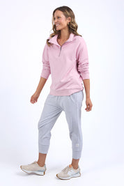 A model wearing the Fundamental Tatum Half Zip Cotton Blend Sweat in colour Softpink (Pink), from the front, showing the whole outfit