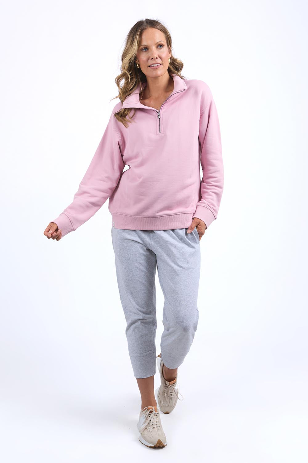 A model wearing the Fundamental Tatum Half Zip Cotton Blend Sweat in colour Softpink (Pink), from the front, showing the whole outfit