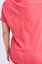 A model wearing the Fundamental Pima Cotton Vee Tee in colour Cayenne (Red), from the front, cropped image