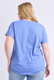 Model Genericm wearing size sample of the Fundamental Pima Vee Tee – Cornflower in colour Cornflower, from the back