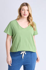A model wearing the Fundamental Pima Cotton Vee Tee in colour Forest (Green), from the front, cropped image