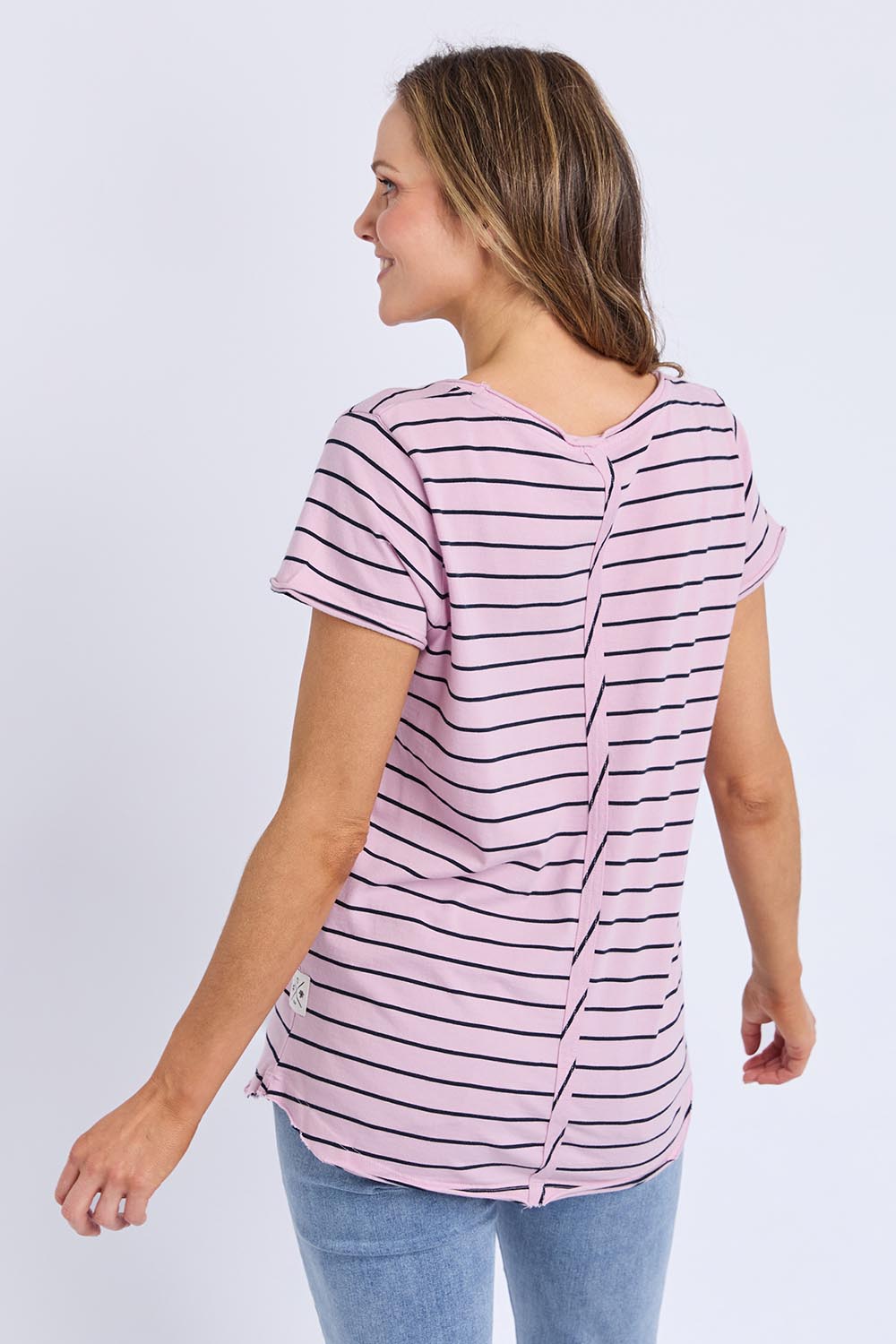 A model wearing the Fundamental Pima Cotton Stripe Vee Tee in colour Pinknavy (Pink), from the back