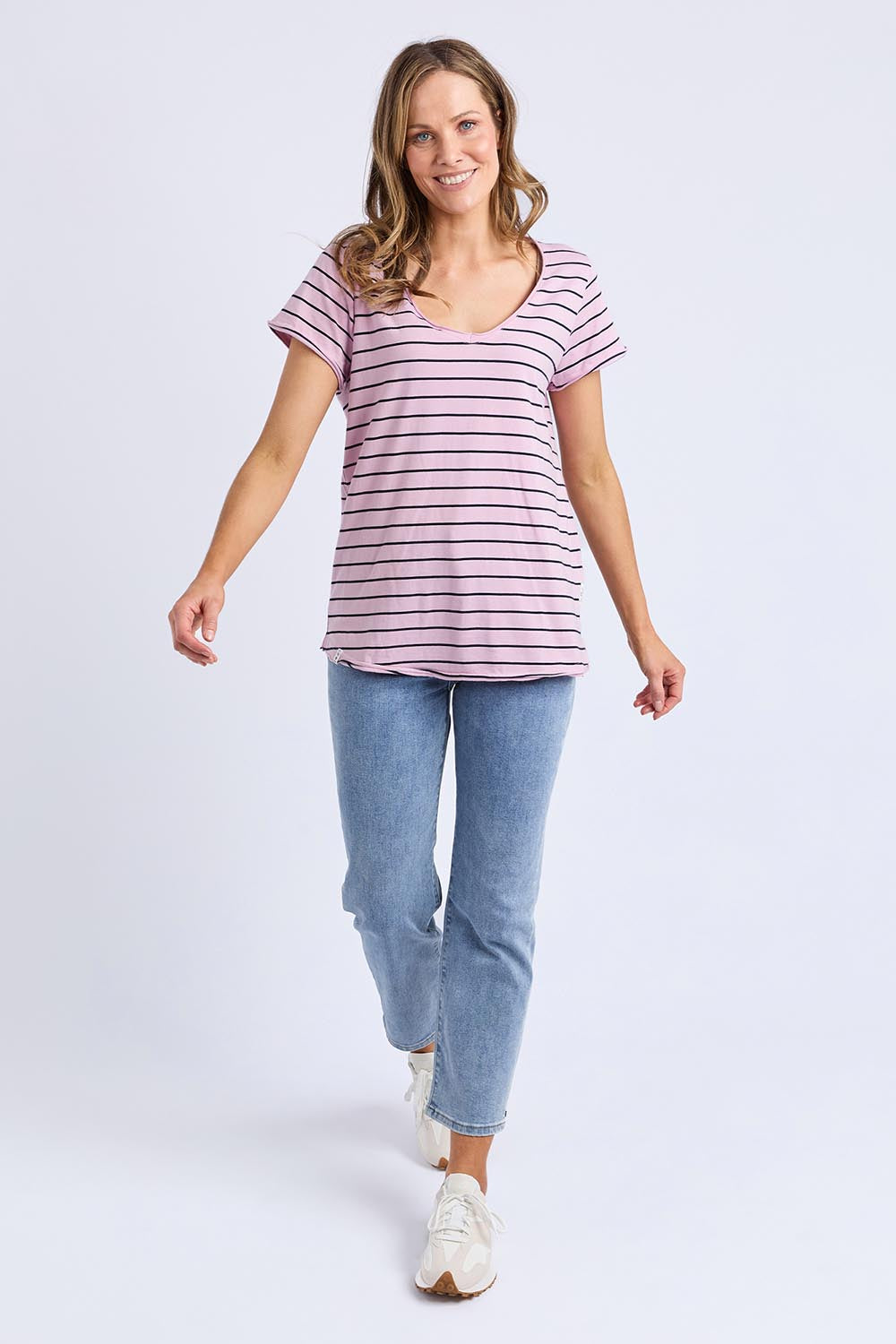 A model wearing the Fundamental Pima Cotton Stripe Vee Tee in colour Pinknavy (Pink), from the front, showing the whole outfit