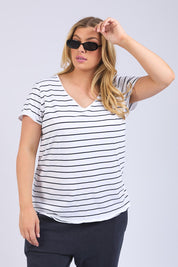 A model wearing the Fundamental Pima Cotton Stripe Vee Tee in colour Whitenavy (White), from the front, cropped image