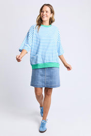 A model wearing the Fundamental Mazie Ringer Cotton Sweat in colour Azurewhite (Blue), from the front, showing the whole outfit
