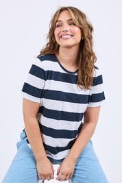 A model wearing the Fundamental Spritz Stripe Ss Cotton Tee in colour Navywhite (Blue), from the front, cropped image