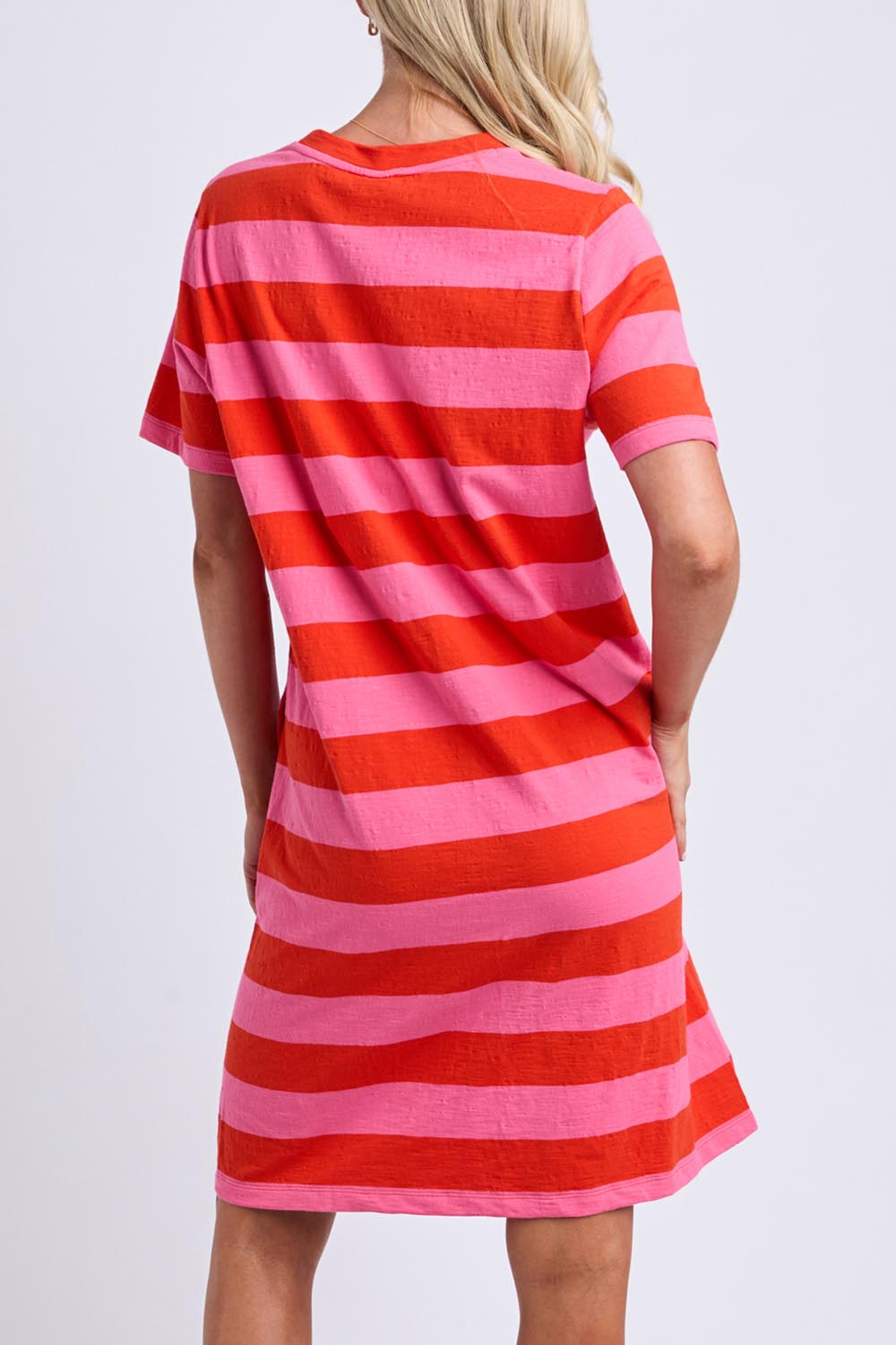 Model Genericm wearing size sample of the Fundamental Spritz Stripe Cotton Dress – Tangpink in colour Tangpink, from the back