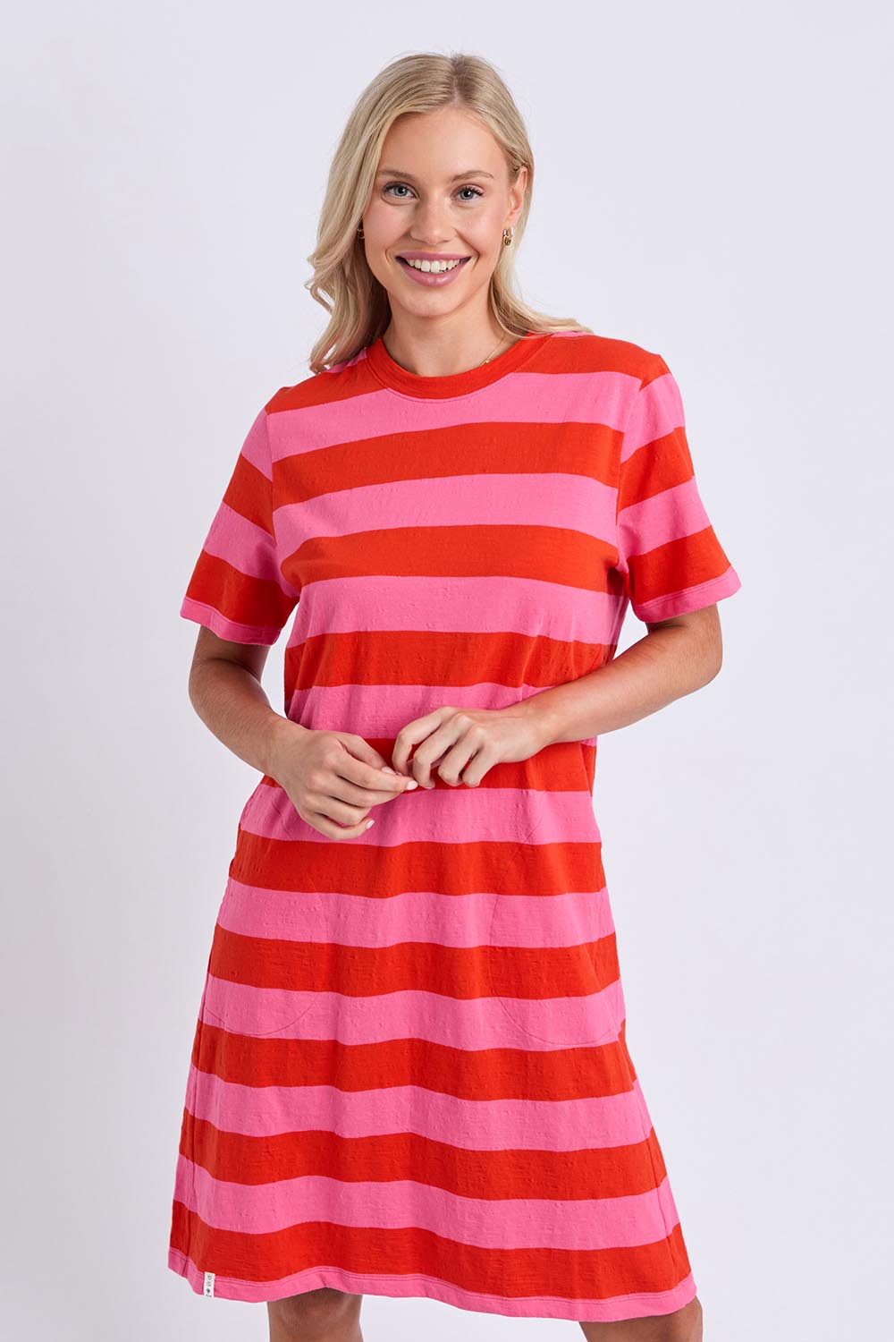 Model Genericm wearing size sample of the Fundamental Spritz Stripe Cotton Dress – Tangpink in colour Tangpink, in a cropped view