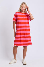 Model Genericm wearing size sample of the Fundamental Spritz Stripe Cotton Dress – Tangpink in colour Tangpink, from the front