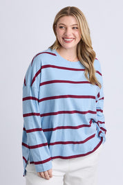 A model wearing the Fundamental Calli Stripe Cotton Long Sleeve Tee in colour Blueplum (Blue), from the front, cropped image