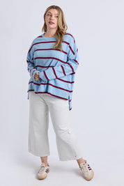A model wearing the Fundamental Calli Stripe Cotton Long Sleeve Tee in colour Blueplum (Blue), from the front, showing the whole outfit