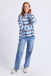 A model wearing the Fundamental Calli Stripe Cotton Long Sleeve Tee in colour Blueplum (Blue), from the front, showing the whole outfit
