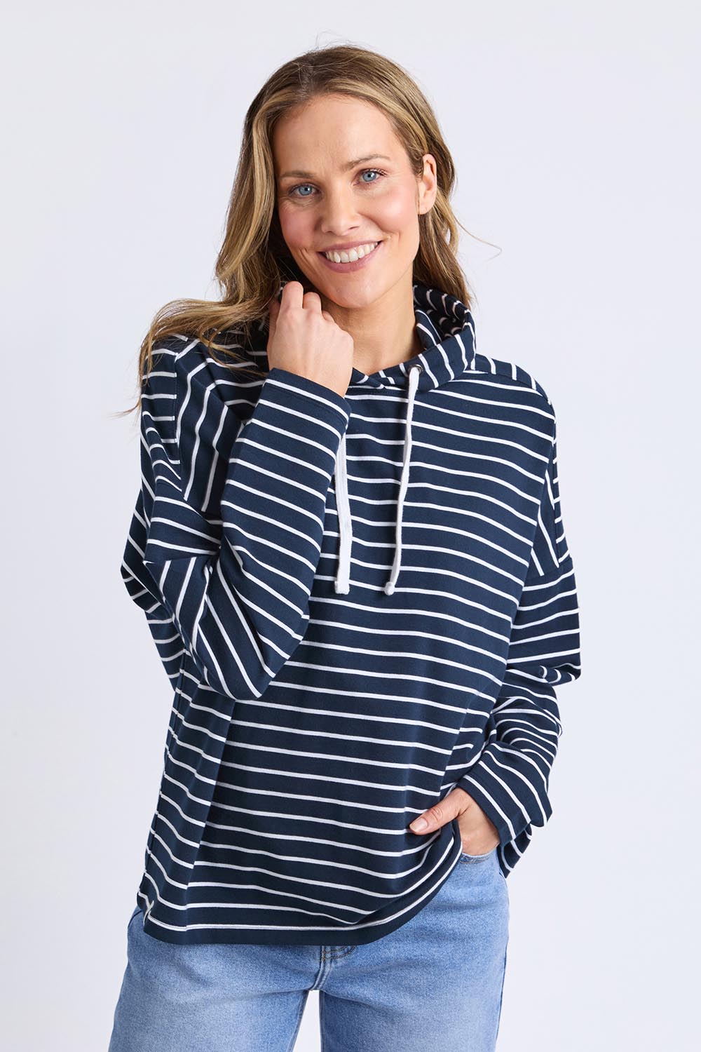 A model wearing the Fundamental Rhea Stripe Cotton Hoodie in colour Navystripe (Blue), from the front, cropped image