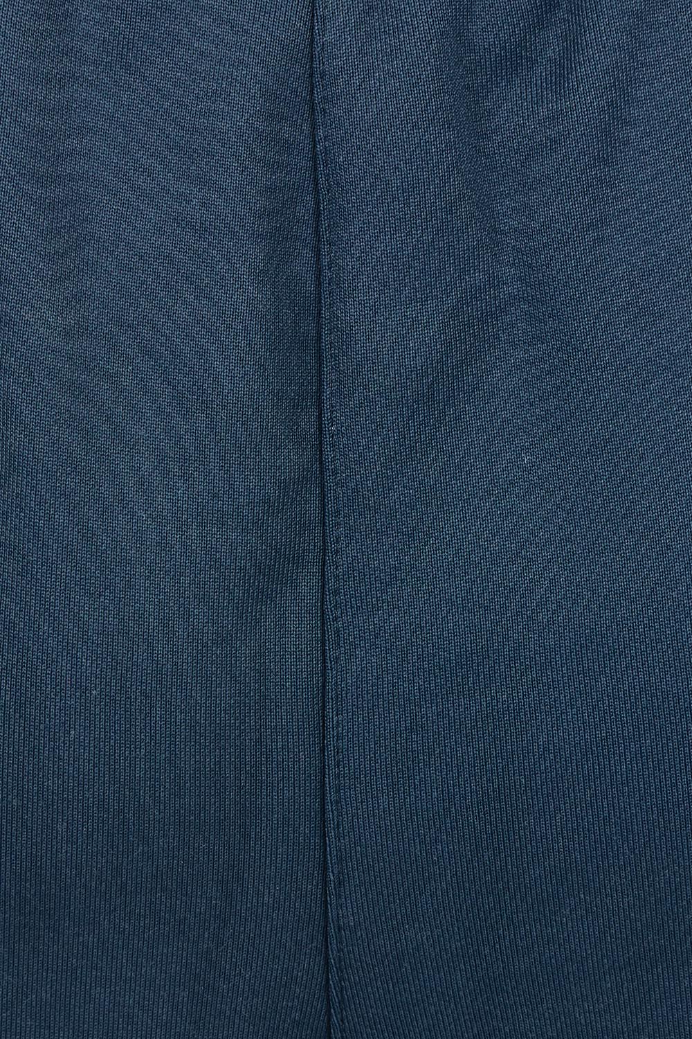 Product shot of the Fundamental Amara Trackpant in colour Navystripe (Blue), detail