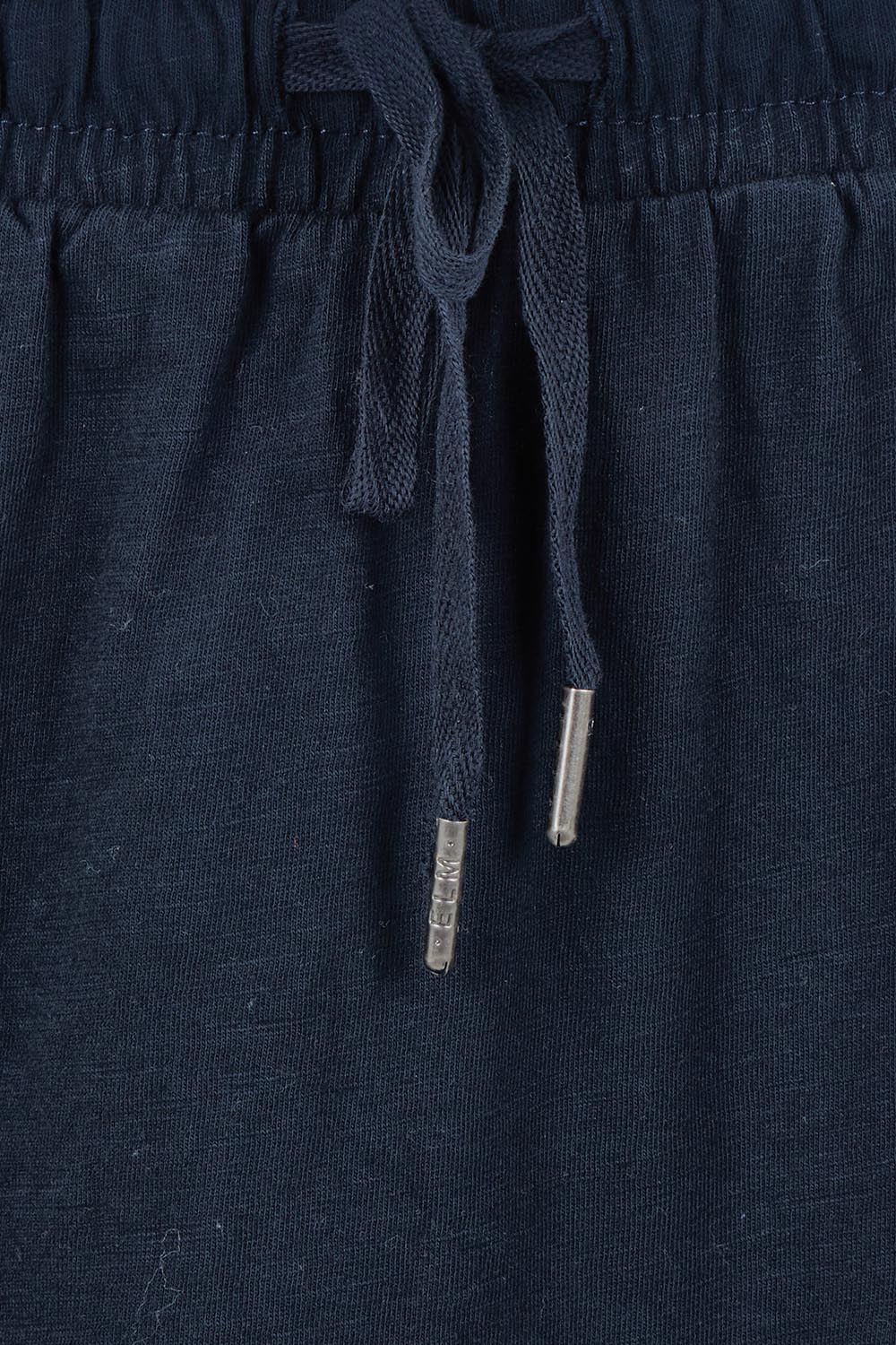 Product shot of the Fundamental Meadow Cotton Skirt – Navy in colour Navy, showing detail