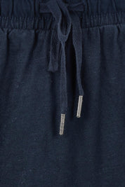 Product shot of the Fundamental Meadow Cotton Skirt – Navy in colour Navy, showing detail