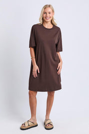 Model Genericm wearing size sample of the Fundamental Mish Cotton Dress – Coffee in colour Coffee, from the front