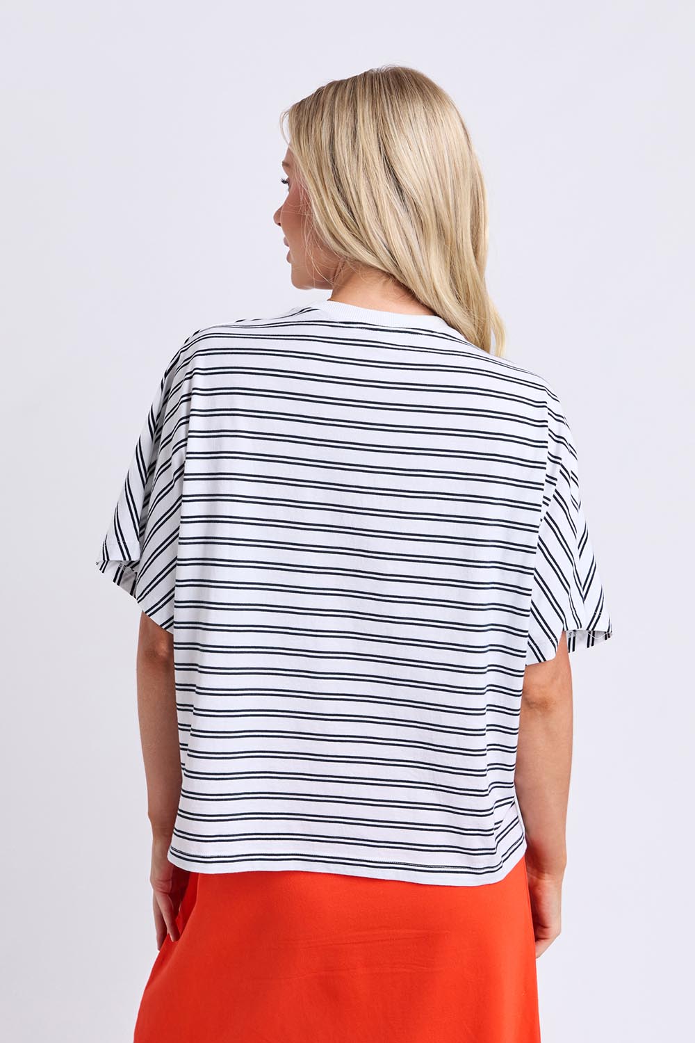 Model Genericm wearing size sample of the Fundamental Luna Ss Stripe Cotton Tee – Whitenavy in colour Whitenavy, from an angle