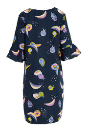 Product shot of the Fruity Tootie Dress in colour Navymulti (Blue), from the back