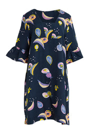 Product shot of the Fruity Tootie Dress in colour Navymulti (Blue), from the front