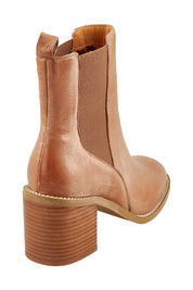 Product shot of the Chai Leather Ankle Boot in colour Latte, from the back