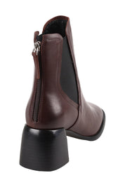 Product shot of the Charlie Leather Ankle Boot in colour Chestnut, from the back