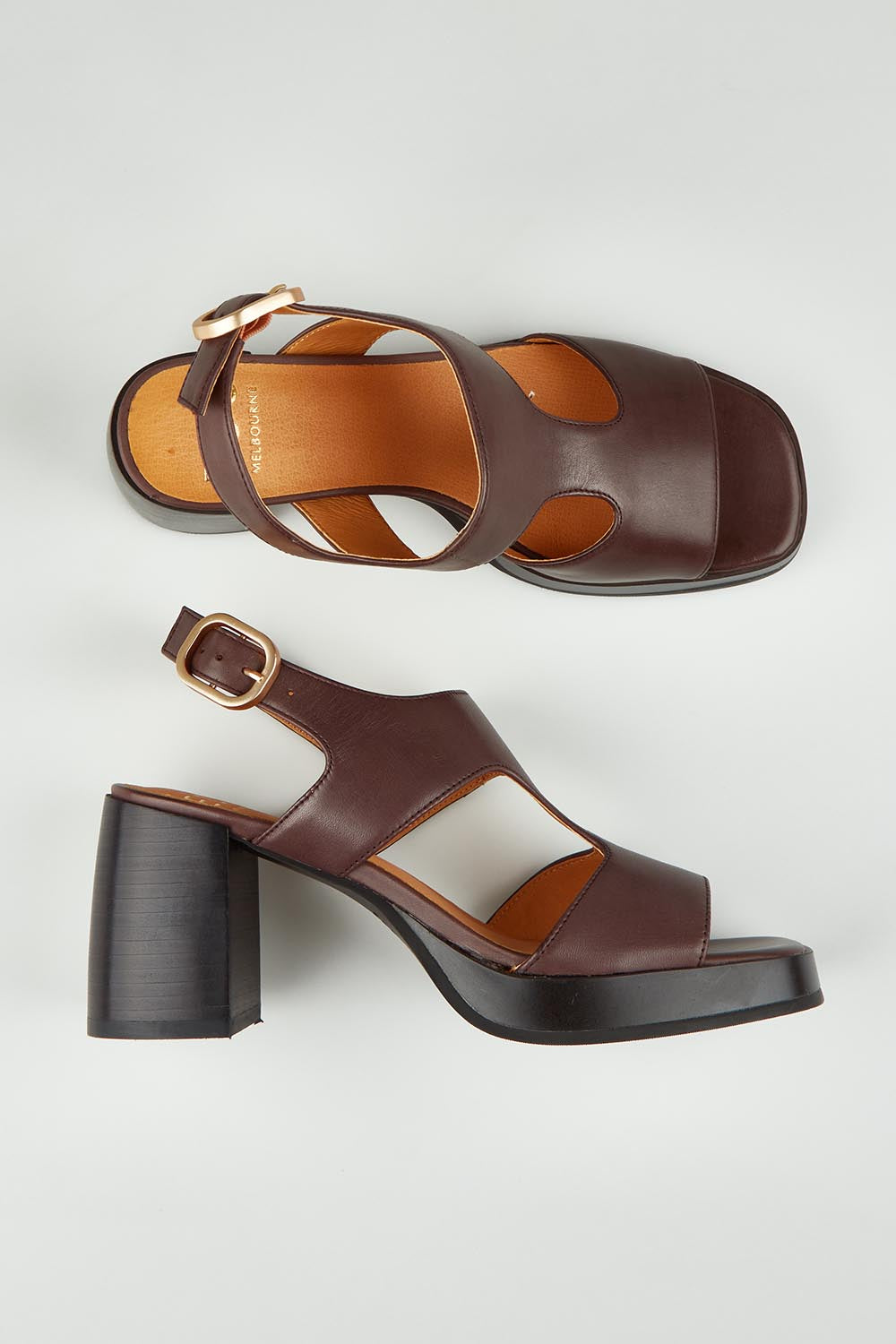 A model wearing size 37 of the Iraia Leather Heel in colour Chestnut, from the front, showing the whole outfit