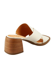 Product shot of the Iso Leather Heel in colour Bone, from the back