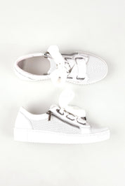 A model wearing size 36 of the Jovi Leather Sneaker in colour Whiteperf (White), from the front, showing the whole outfit