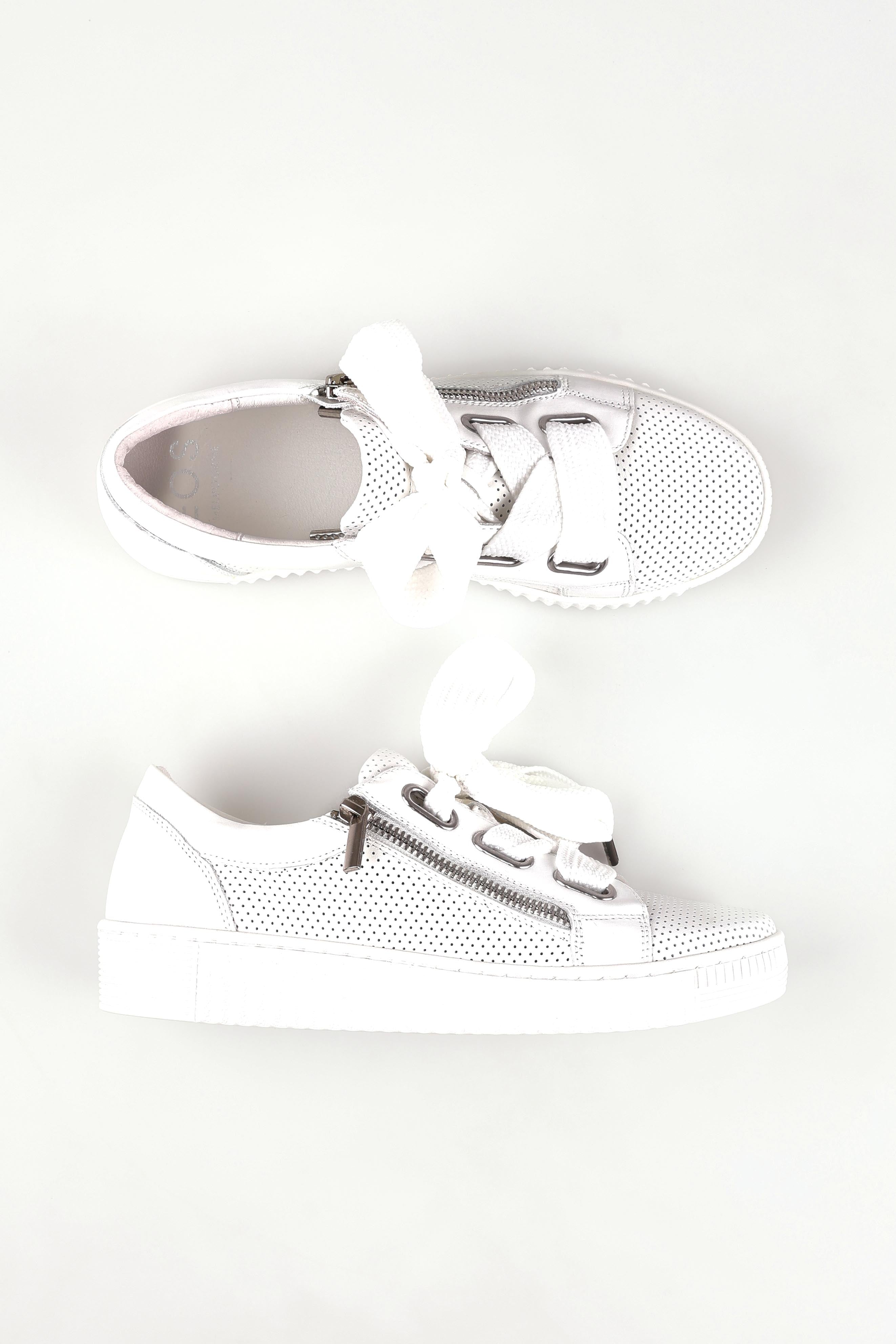 A model wearing size 36 of the Jovi Leather Sneaker in colour Whiteperf (White), from the front, showing the whole outfit