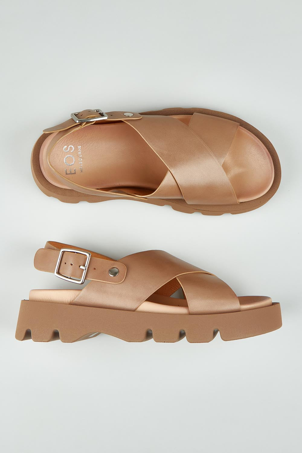 A model wearing size 37 of the Monnis Leather Sandal in colour Taupe, from the front, showing the whole outfit