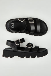 A model wearing size 37 of the Monn Leather Sandal in colour Black (Black), from the front, showing the whole outfit