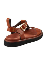 Product shot of the Slays Leather Sandal in colour Brandy, from the back