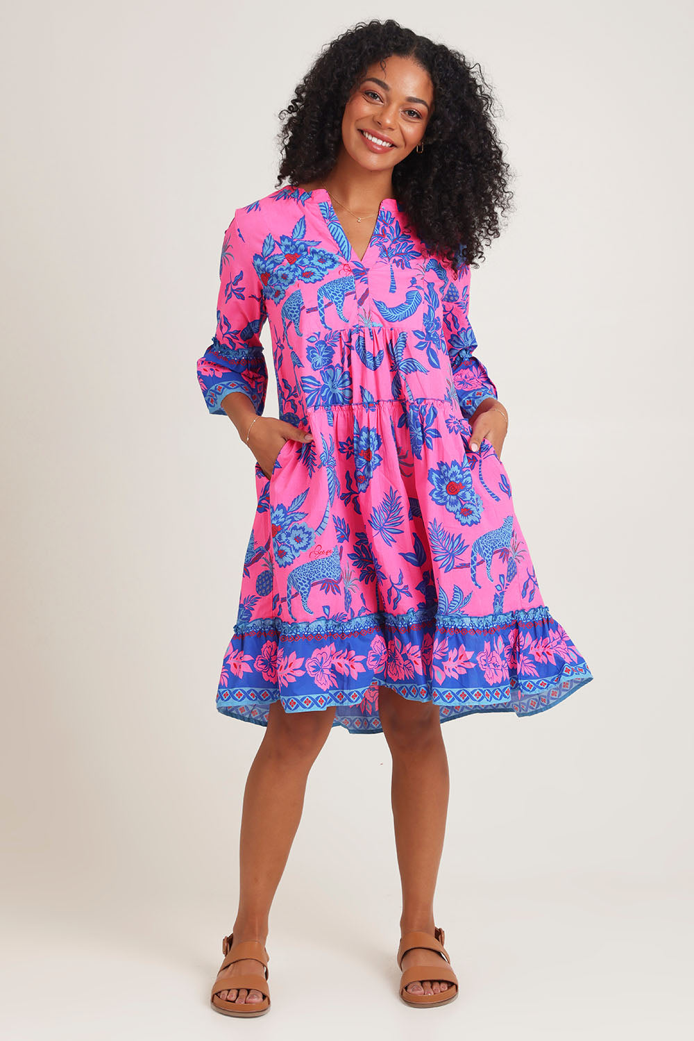 Model Ziara wearing size 10 of the Lidia Cotton Frill Sleeve Layers Dress in colour Print, from the front, showing the whole outfit