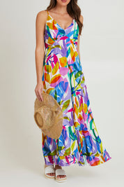 Model Madeline wearing size 10 of the Melinda White Maxi Strappy Dress in colour White (Blue), from the front, cropped image