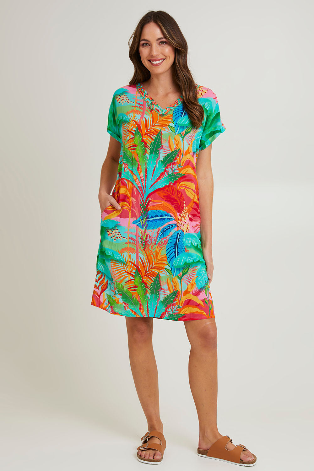 Model Madeline wearing size 10 of the Alisa Shift Short Sleeve Dress in colour Print (Green), from the front, showing the whole outfit
