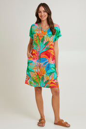 Model Madeline wearing size 10 of the Alisa Shift Short Sleeve Dress in colour Print (Green), from the front, showing the whole outfit