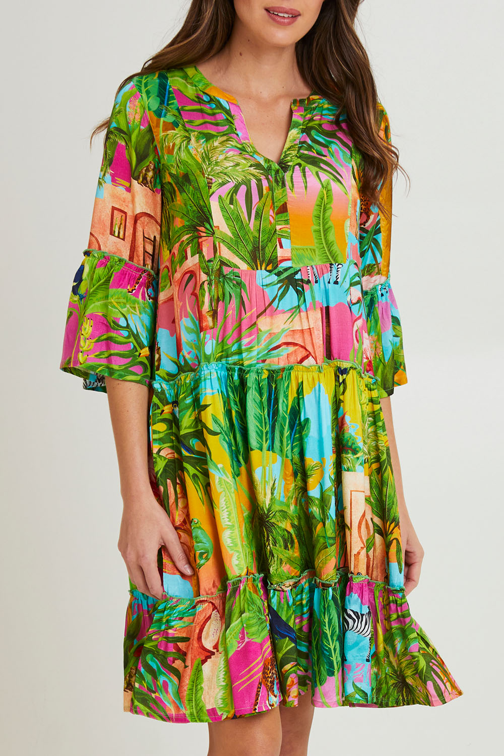 Model Madeline wearing size 10 of the Lani Frill 3/4 Sleeve Dress in colour Print (Green), from the front, cropped image