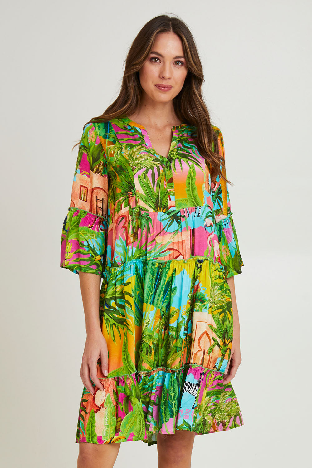 Model Madeline wearing size 10 of the Lani Frill 3/4 Sleeve Dress in colour Print (Green), from the front, cropped image