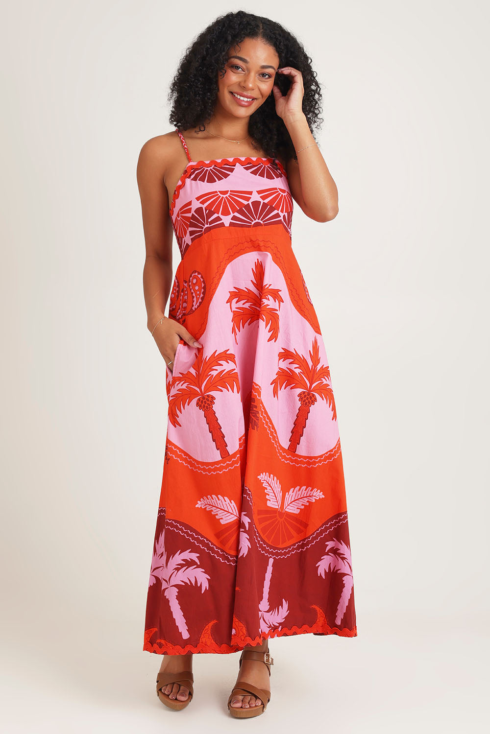 Model Ziara wearing size 10 of the Celeste Orange Cotton Strappy Dress in colour Orange, from the front, showing the whole outfit
