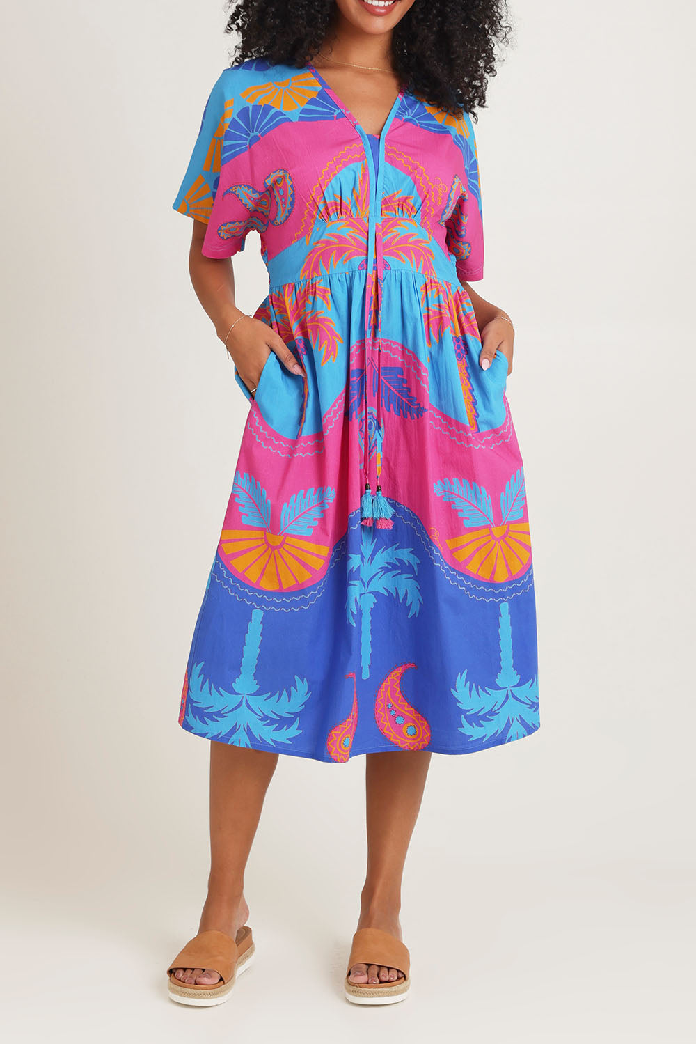 Model Ziara wearing size 10 of the Celestial Blue Cotton Midi Dress in colour Blue, from the front, cropped image
