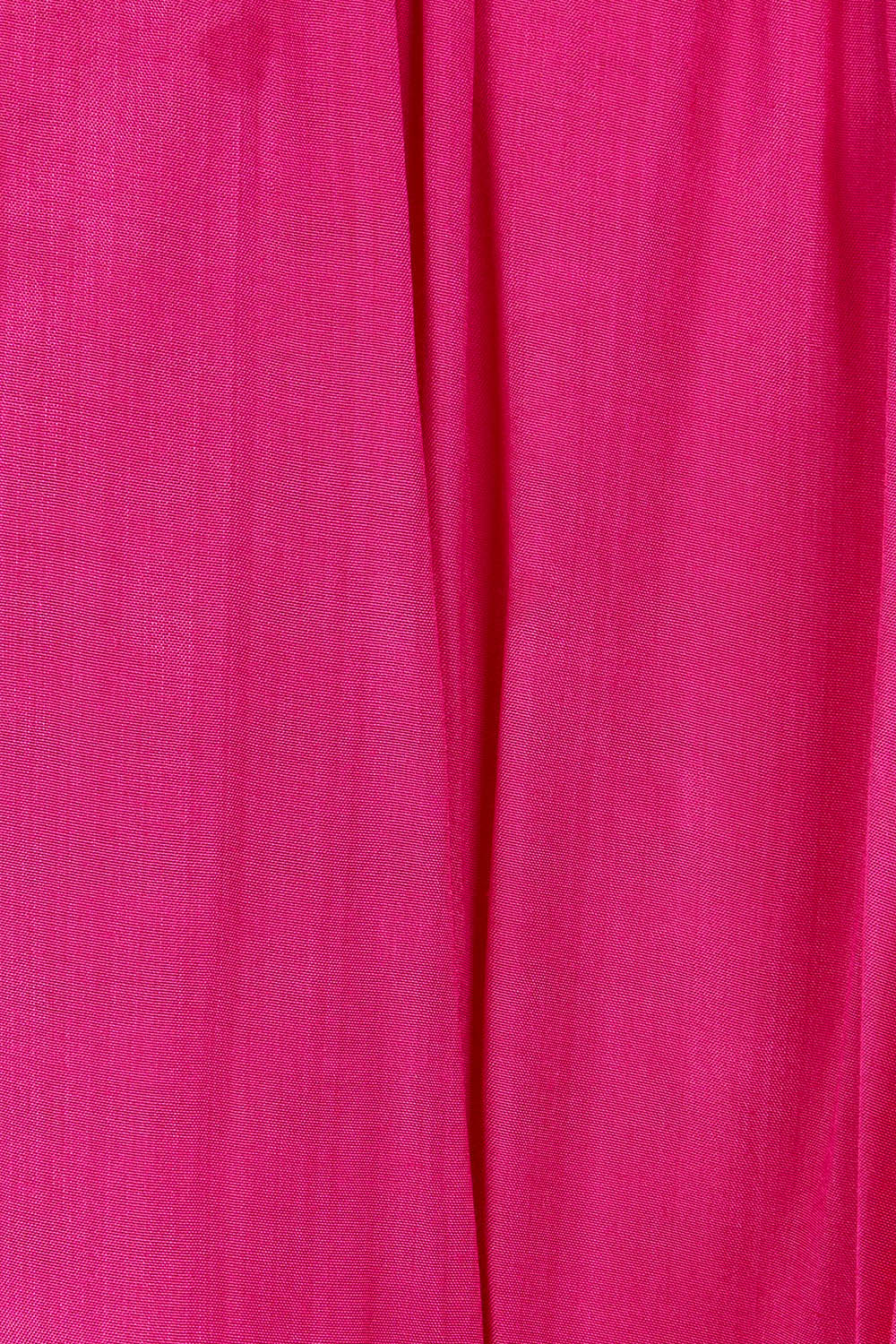Product shot of the Lux Essentials Top in colour Fushia (Pink), detail