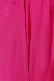 Product shot of the Lux Essentials Top in colour Fushia (Pink), detail