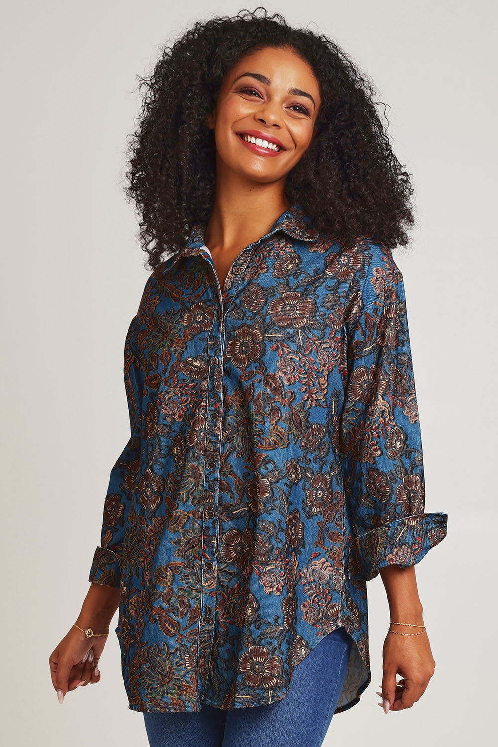 Model Ziara wearing size 10 of the Iguazu Cotton Shirt in colour Iguazu (Blue), from the front, cropped image