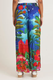 Model Ziara wearing size 10 of the Arabian Nights Pants in colour Print, from the back